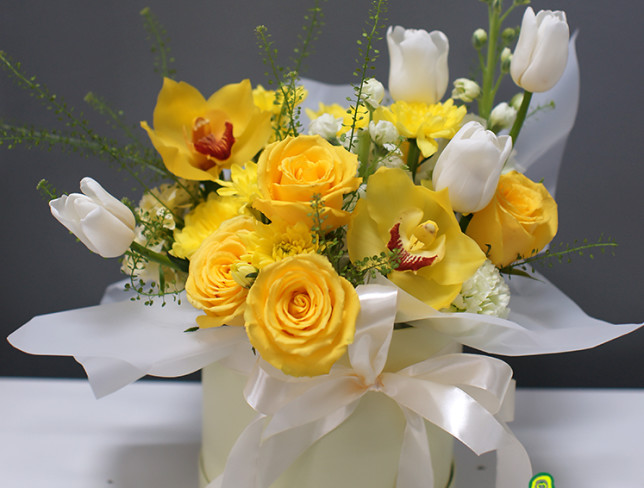 Box with yellow roses and white tulips photo